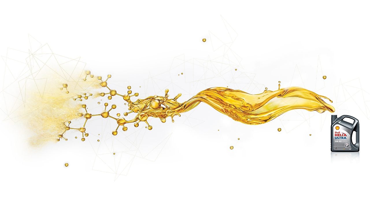 Канистра с маслом Shell helix ultra, у которой из открытой горловины льется масло